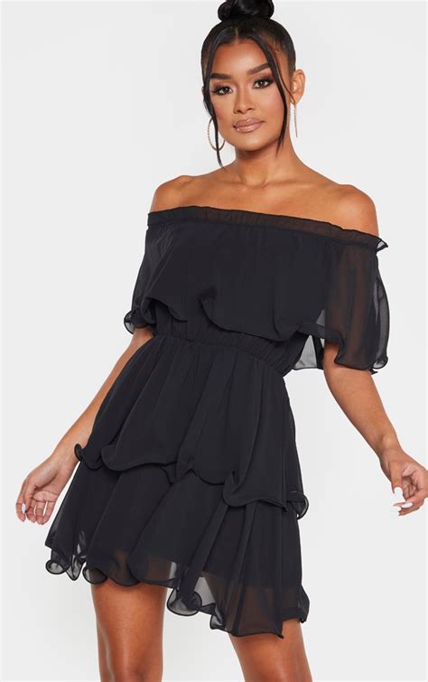 black ruffle dress.